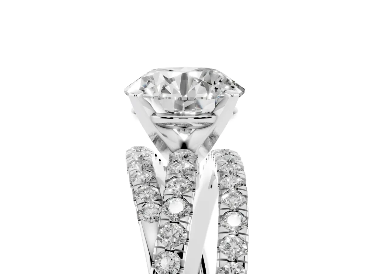 Round Cut Solitaire Twist Band with Pavé Setting and Four-Prong Setting Silver