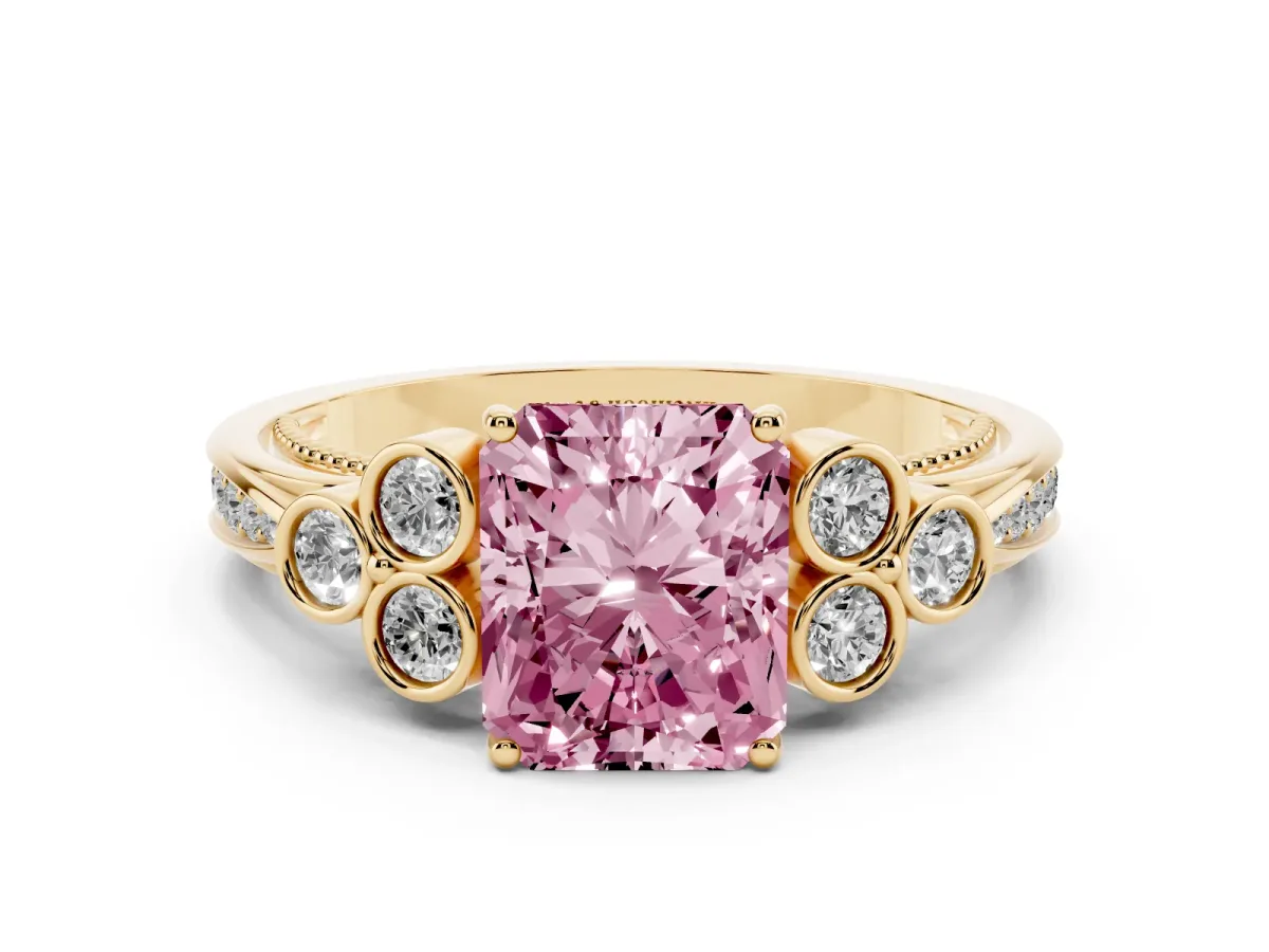 Fancy Pink Radiant Cut Cut Diamond Engagement Ring with Bezel Set Round Side Stones and Prong Setting Yellow gold