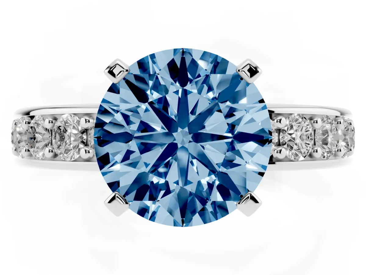 Fancy Blue Round Cut Diamond Engagement Ring with Channel Set Round Band and Prong Setting White gold