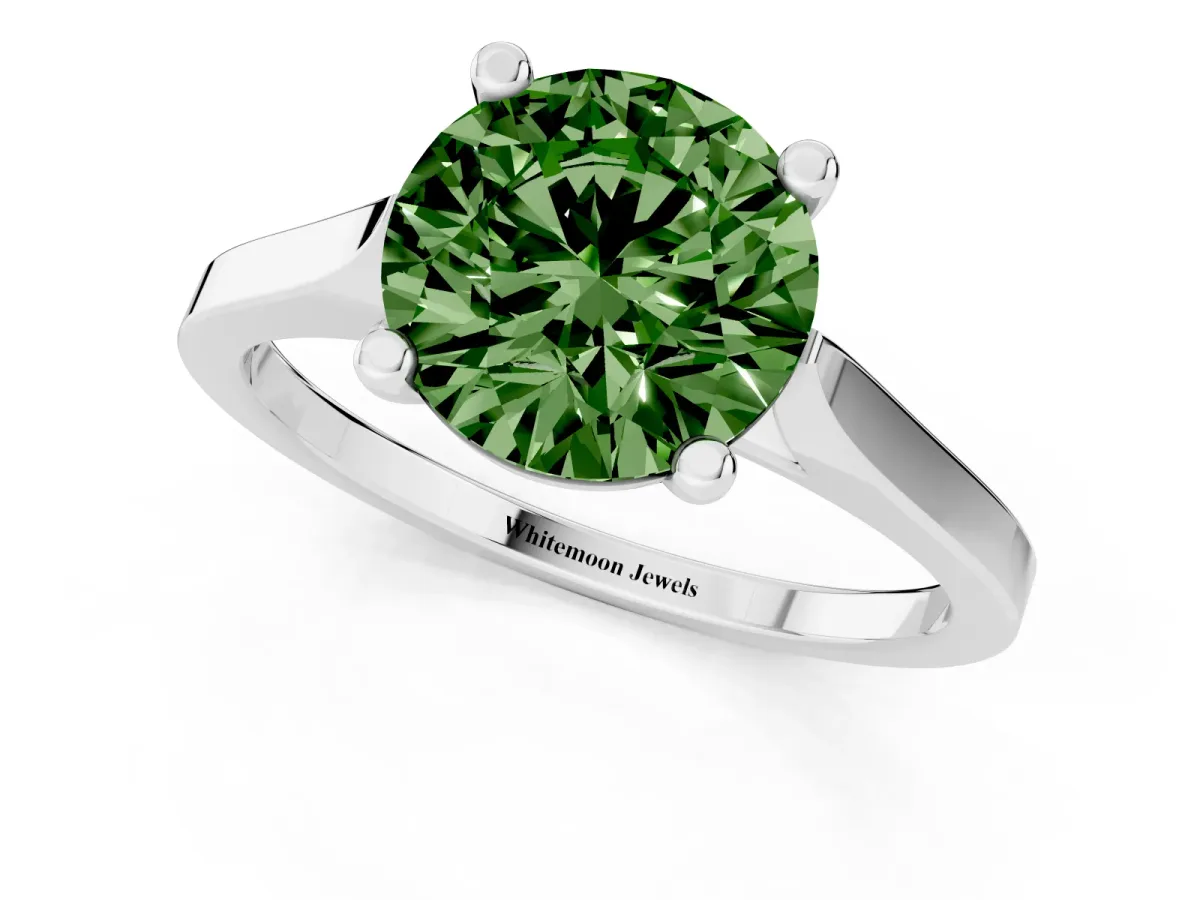 Fancy Green Round Cut Solitaire Diamond Ring with Four-Prong Setting and Tapered Band White gold