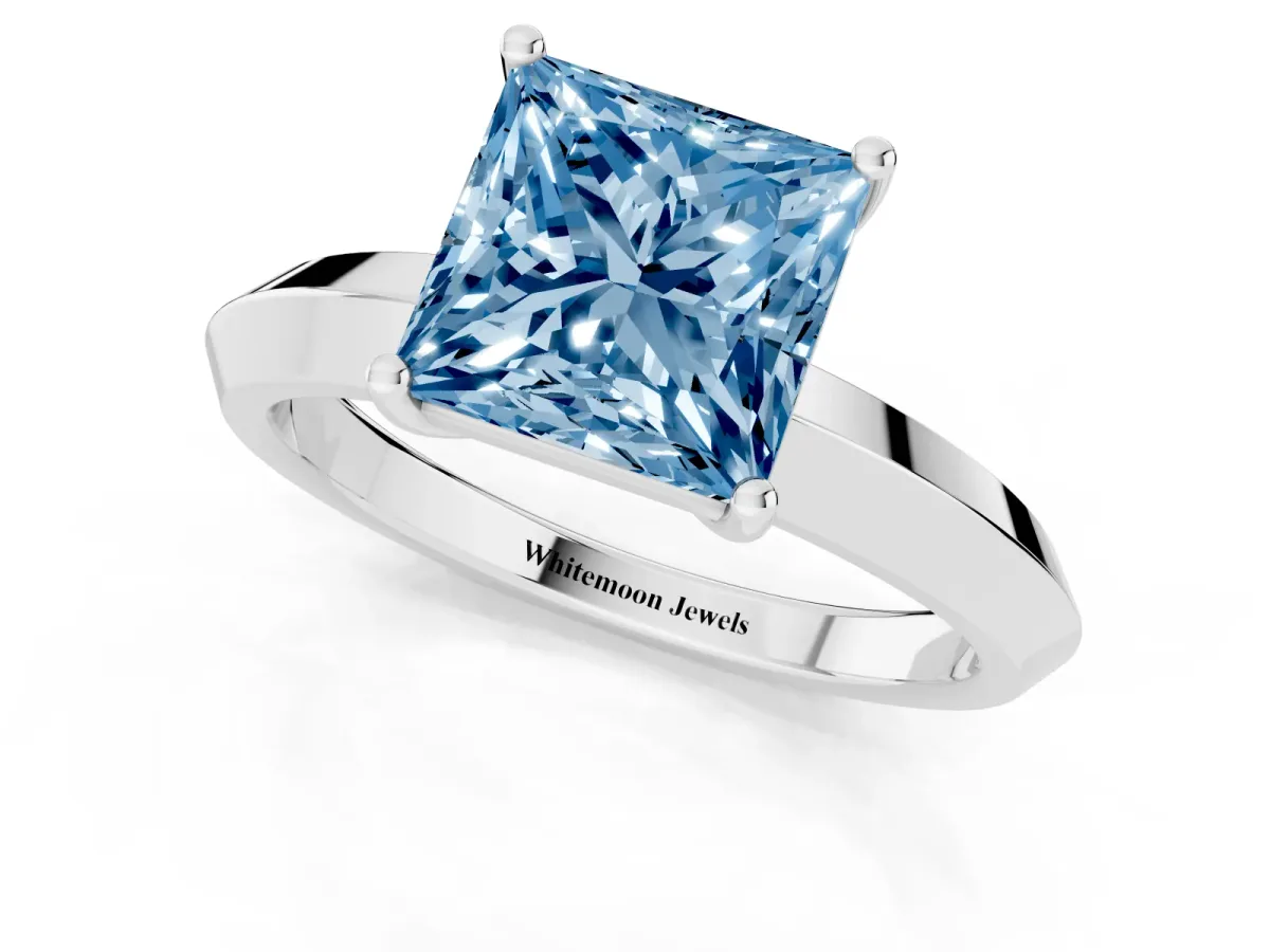 Fancy Blue Princess Cut Cut Solitaire Engagement Ring with Flat Band and Four-Prong Setting Silver