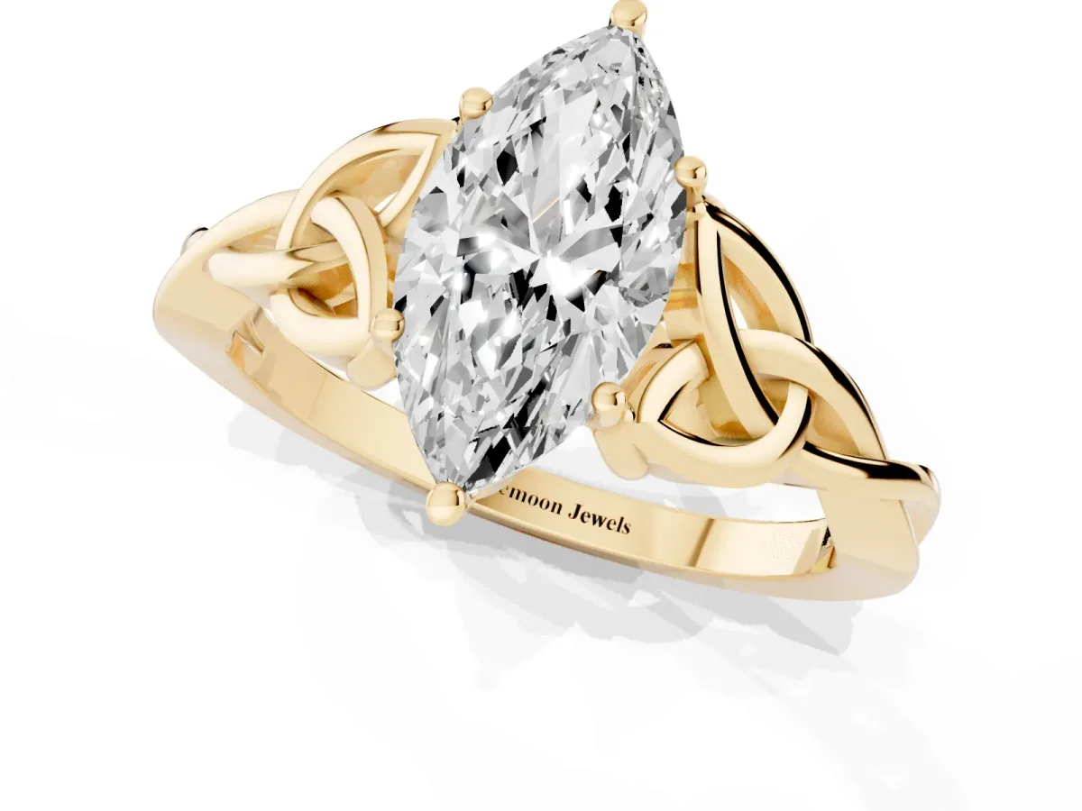 Marquise Cut Diamond Solitaire Engagement Ring with Celtic Knot Band and Four-Prong Setting Yellow gold