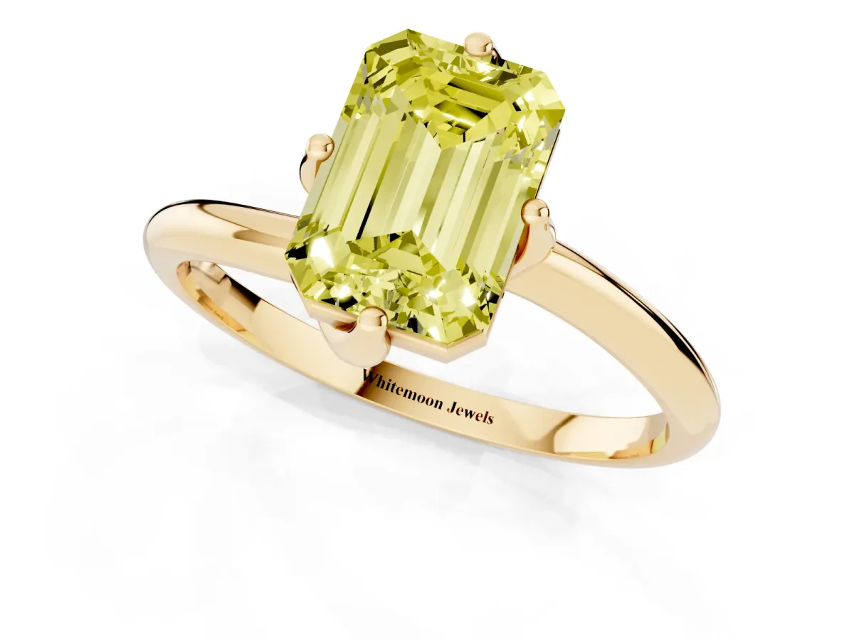 Fancy Yellow Emerald Cut Diamond Solitaire Engagement Ring with Four-Prong Setting and Classic Band Yellow gold
