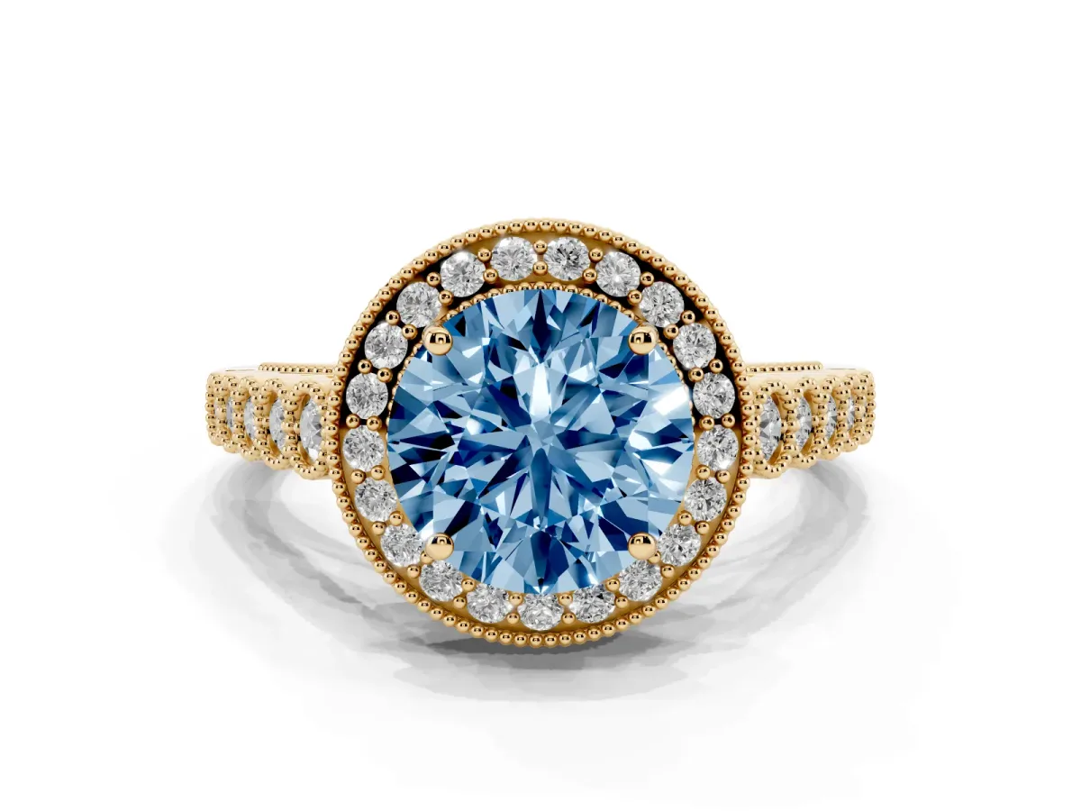Fancy Blue Round Cut Halo Milgrain Solitaire with Bezel Set Side Stones and Pave Band Yellow gold