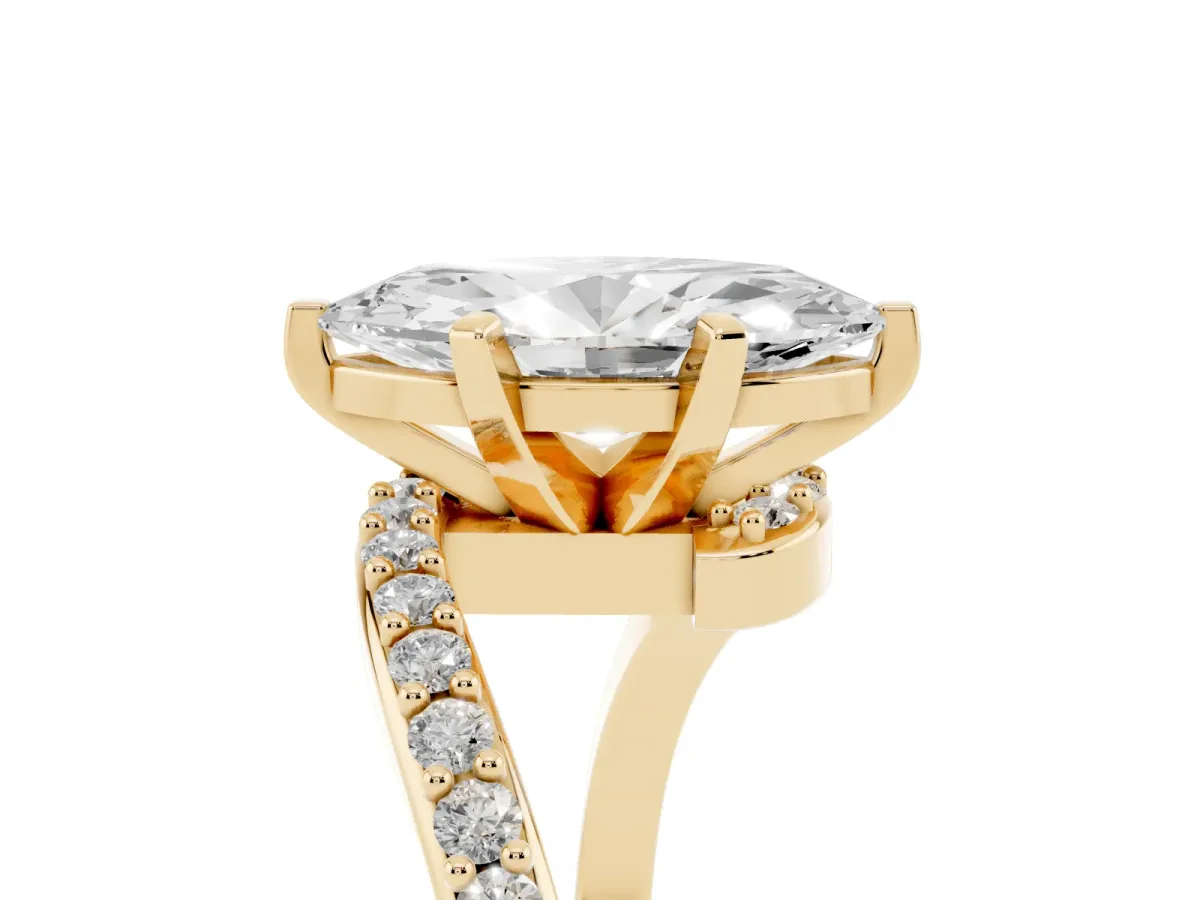 Marquise Cut Solitaire Twist Band with Pave Set Diamonds and Four-Prong Setting Yellow gold