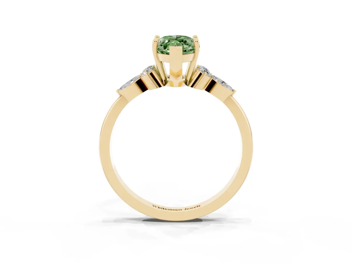 Fancy Green Marquise Cut Brilliant Diamond Solitaire Ring with Pear Side Stones and Four-Prong Setting Yellow gold