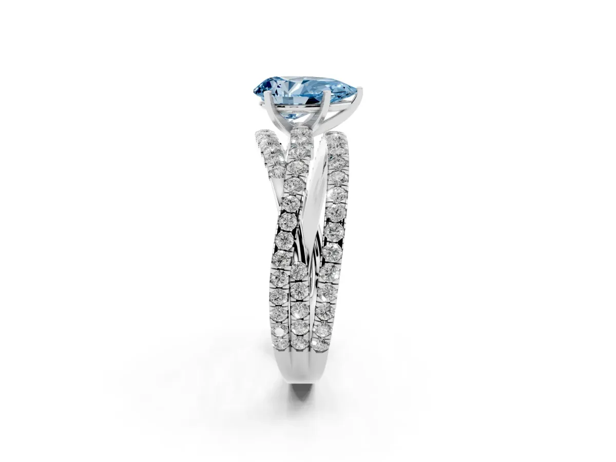 Fancy Blue Pear Cut Solitaire Twist Band with Pavé Setting and Four-Prong Setting Silver