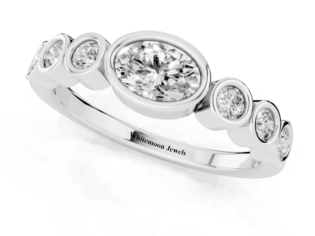 Bezel Set Oval Diamond Half Eternity Band Platinum