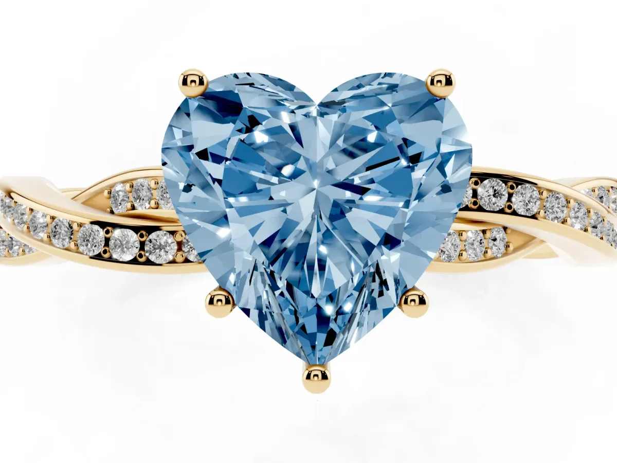 Fancy Blue Heart Cut Solitaire Twisted Pave Diamond Ring with Four-Prong Setting Yellow gold