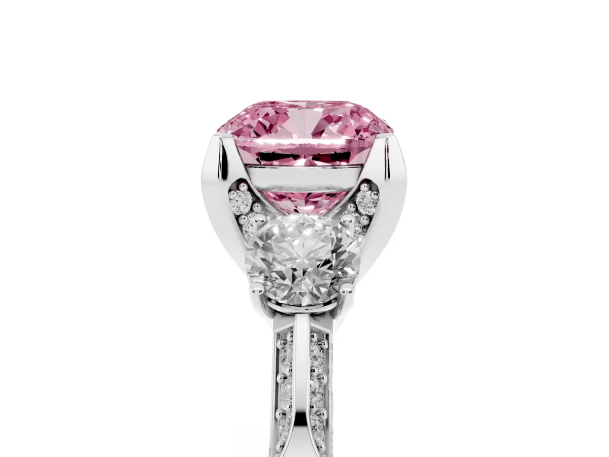 Fancy Pink Cushion Cut Brilliant Three-Stone Diamond Ring with Pavé Band and Four-Prong Setting Platinum