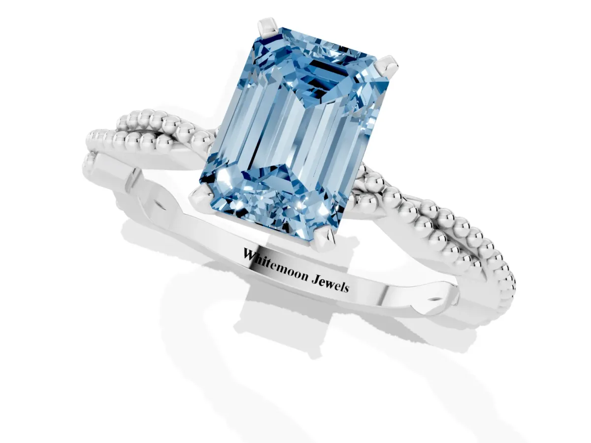 Fancy Blue Emerald Cut Solitaire Twisted Band with Bead Prong Setting Silver