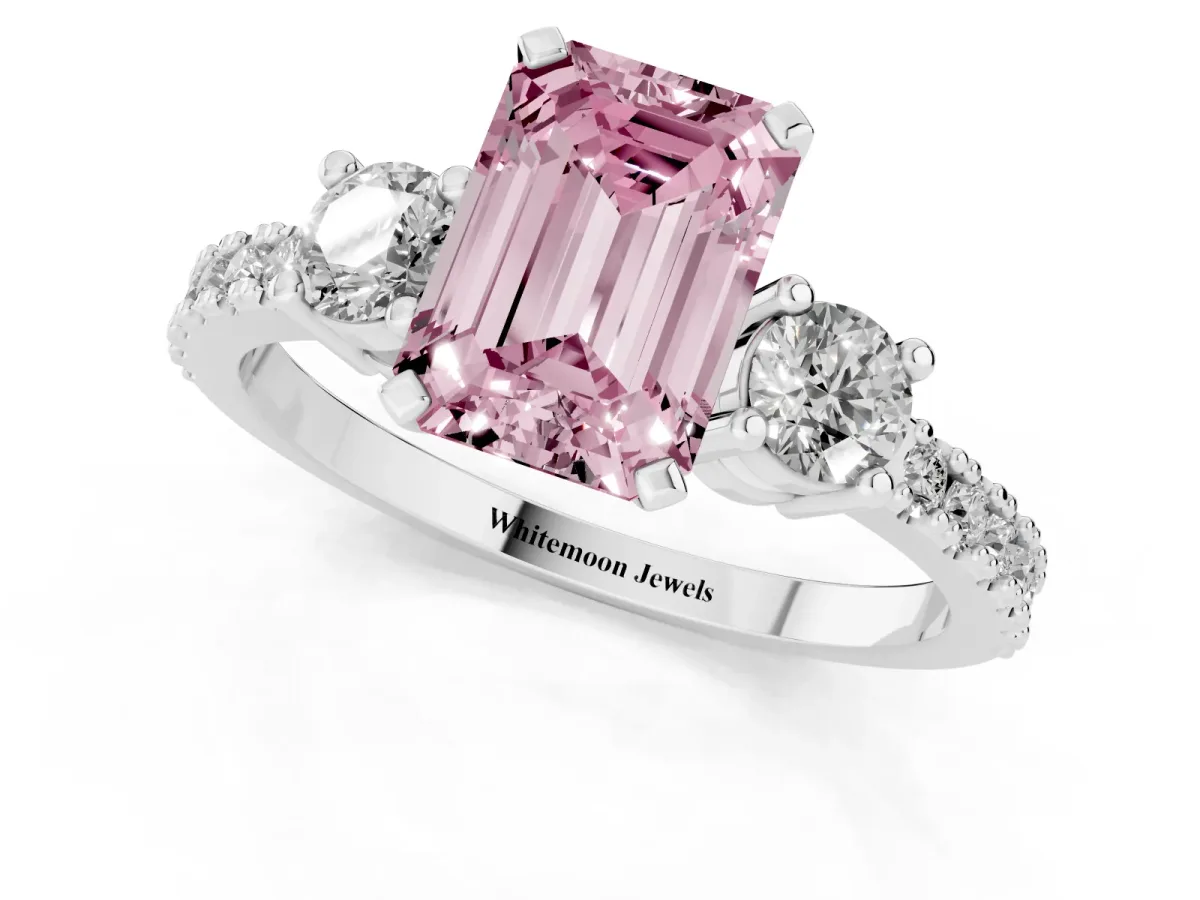Fancy Pink Emerald Cut Three-Stone Diamond Pavé Band with Prong Setting Platinum