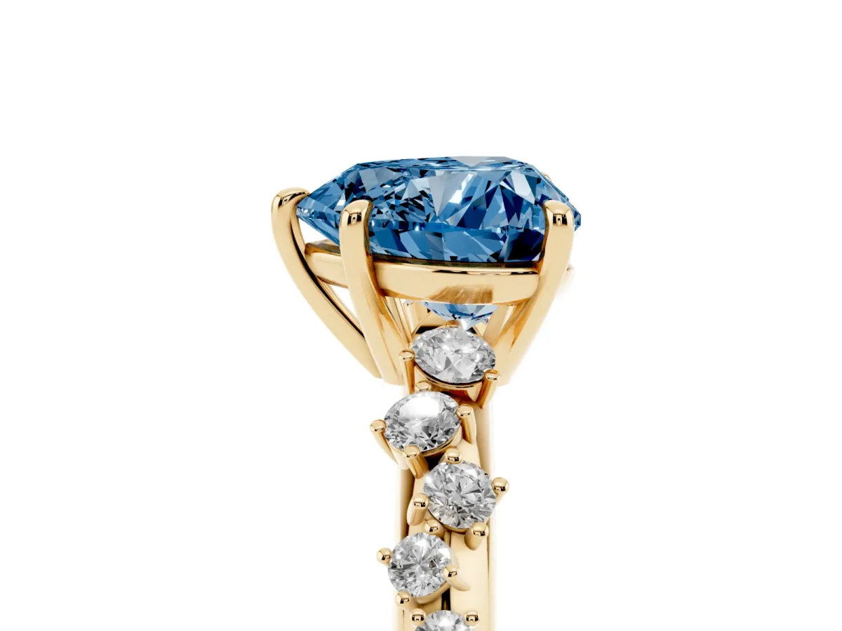 Fancy Blue Heart Cut Diamond Cluster Side Stone Solitaire Ring with Prong Setting Yellow gold