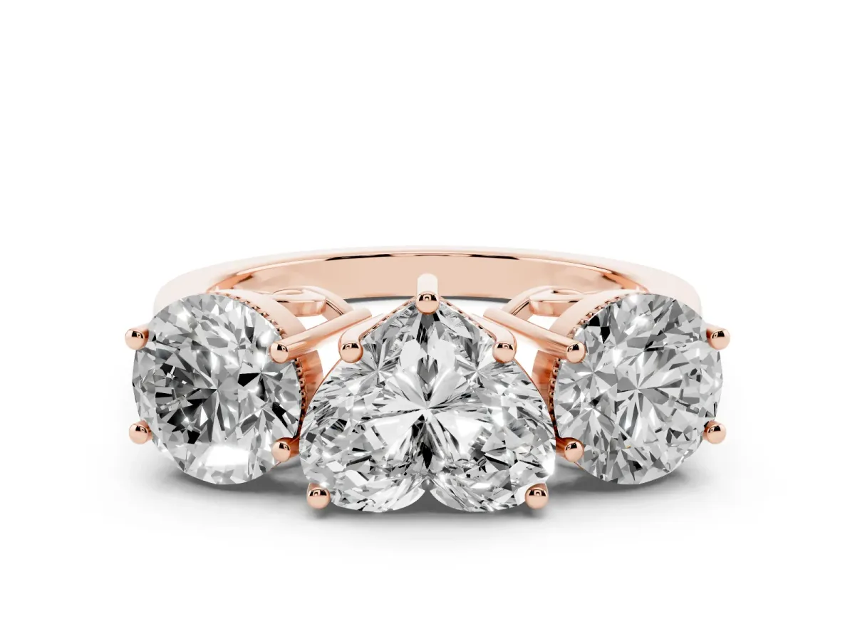 Three-Stone Heart Cut Diamond Engagement Ring with Prong Setting on a Classic Band Rose gold