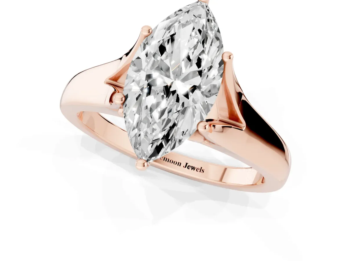 Marquise Cut Solitaire Diamond Ring with Cathedral Band and Four-Prong Setting Rose gold