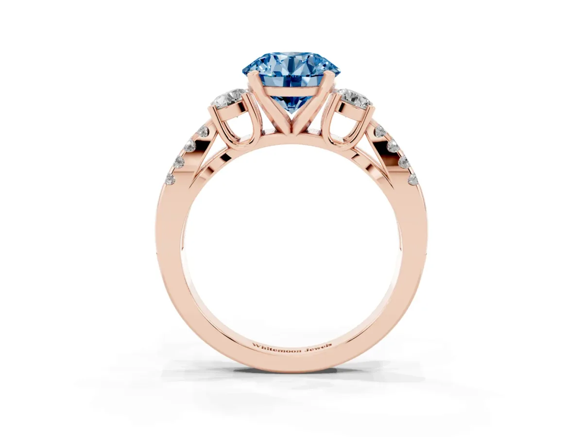 Fancy Blue Round Cut Diamond Three-Stone Ring with Pavé Split Shank and Four-Prong Setting Rose gold
