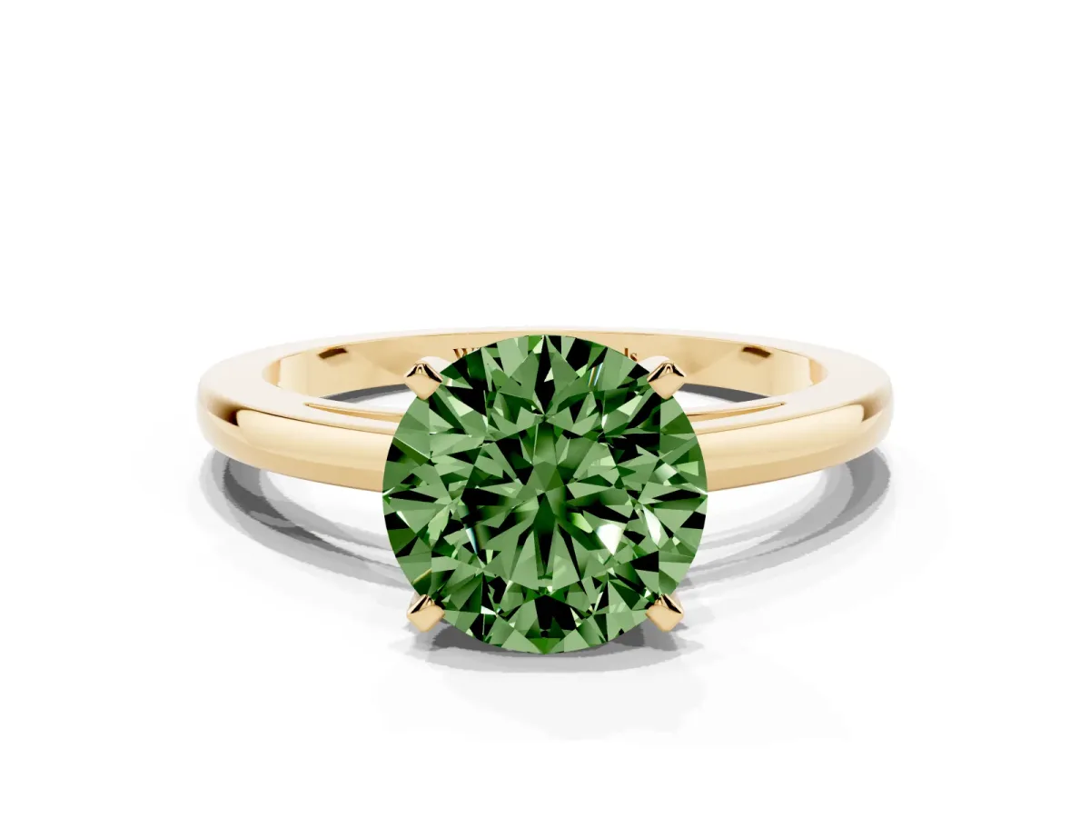 Fancy Green Round Cut Solitaire Diamond Engagement Ring with Four-Prong Setting on a Classic Band Yellow gold