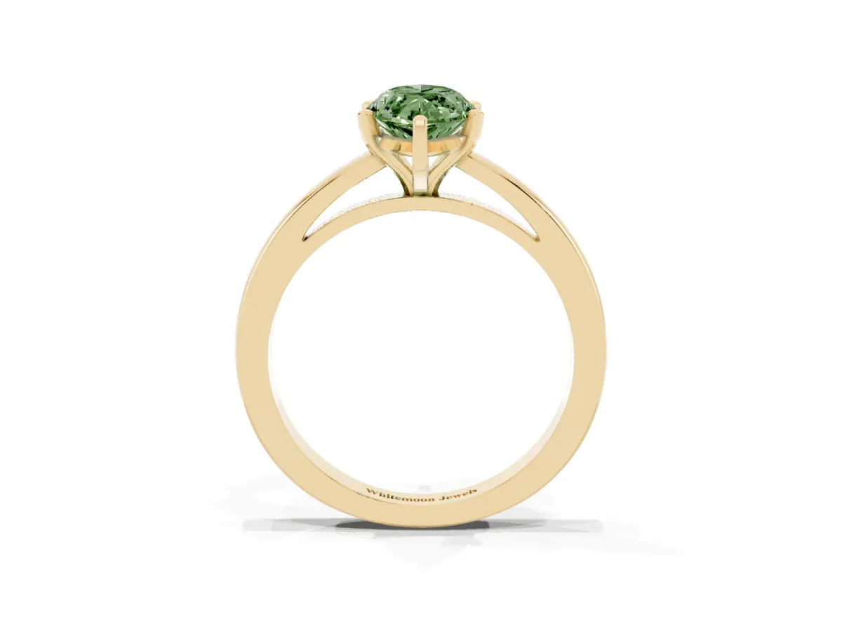 Fancy Green Marquise Cut Solitaire Diamond Engagement Ring with Four-Prong Setting on a Classic Band Yellow gold