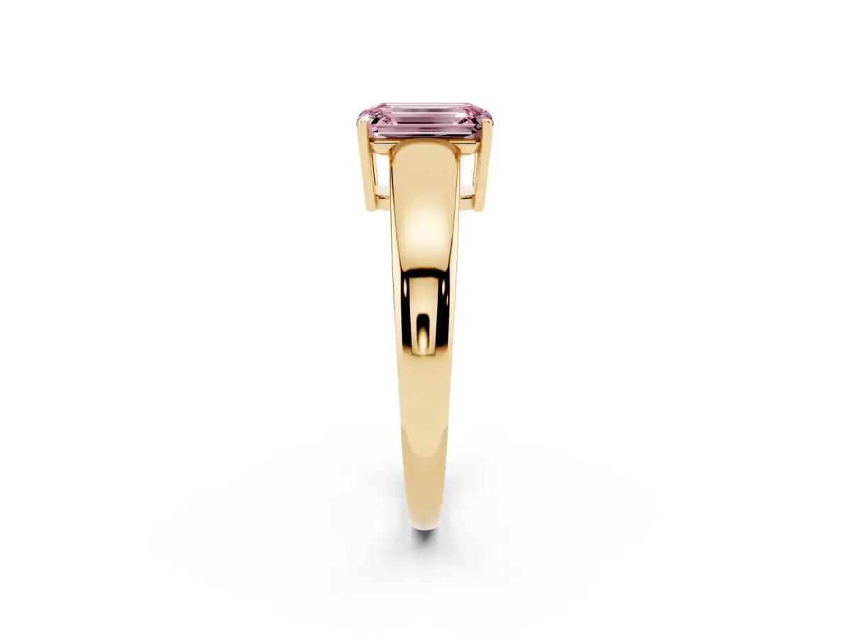 Fancy Pink Emerald Cut Solitaire Diamond Ring with Tapered Band and Four-Prong Setting Yellow gold