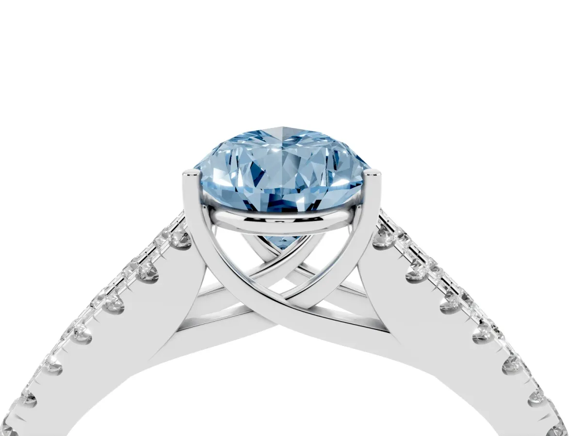 Fancy Blue Pear Cut Diamond Split Shank Engagement Ring with Round Pavé and Prong Setting Platinum