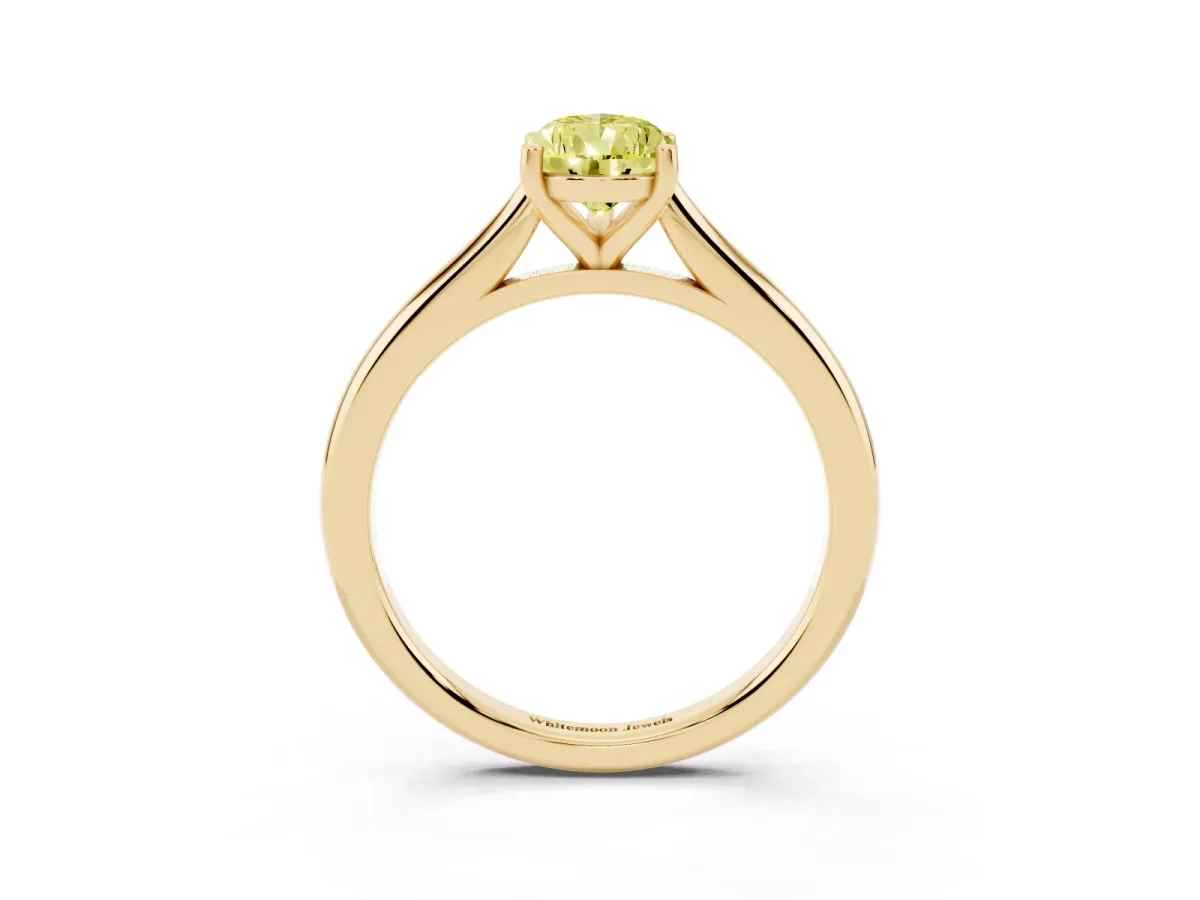 Fancy Yellow Pear Cut Cut Solitaire Ring with Cathedral Band and Four-Prong Setting Yellow gold