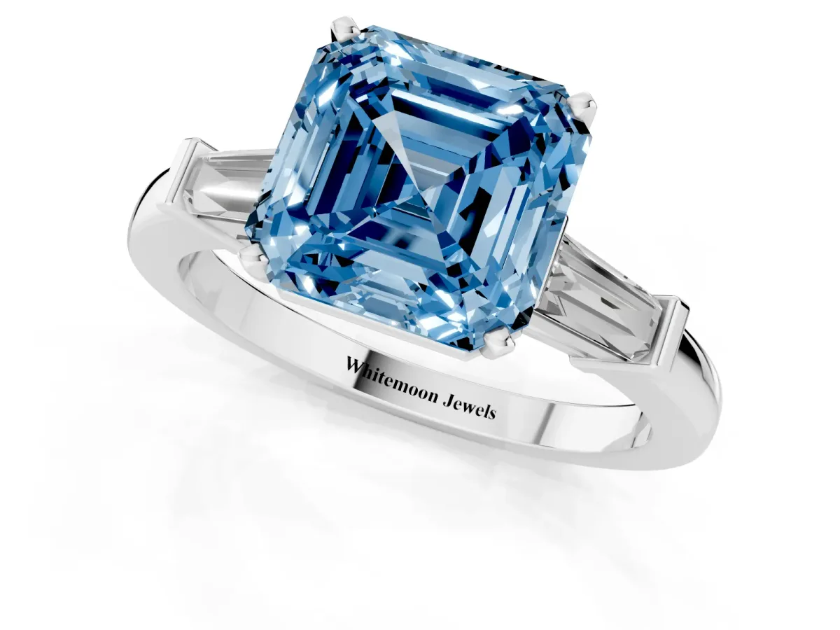 Fancy Blue Asscher Cut Cut Diamond Solitaire Ring with Tapered Baguette Accents and Four-Prong Setting White gold