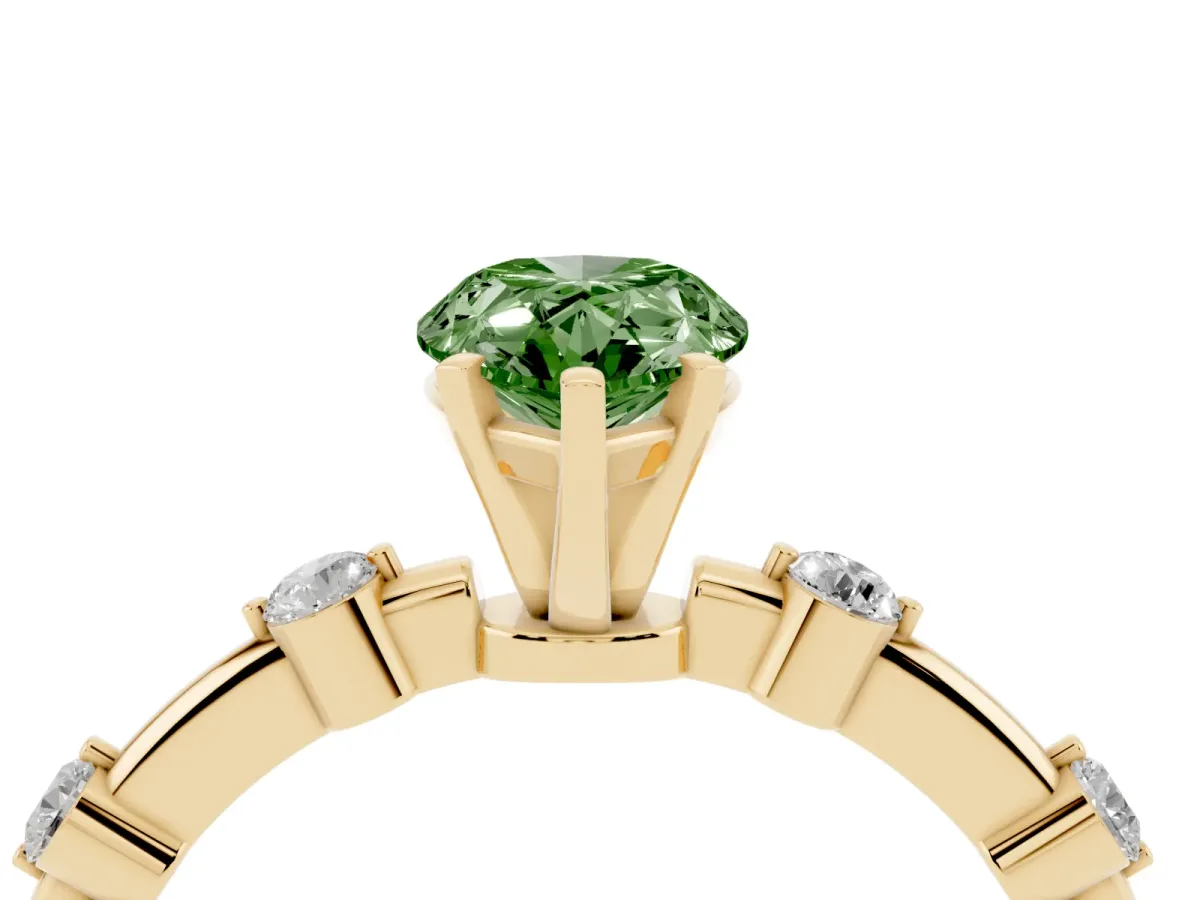 Fancy Green Pear Cut Solitaire Diamond Ring with Bezel Set Side Stones and Prong Setting Yellow gold