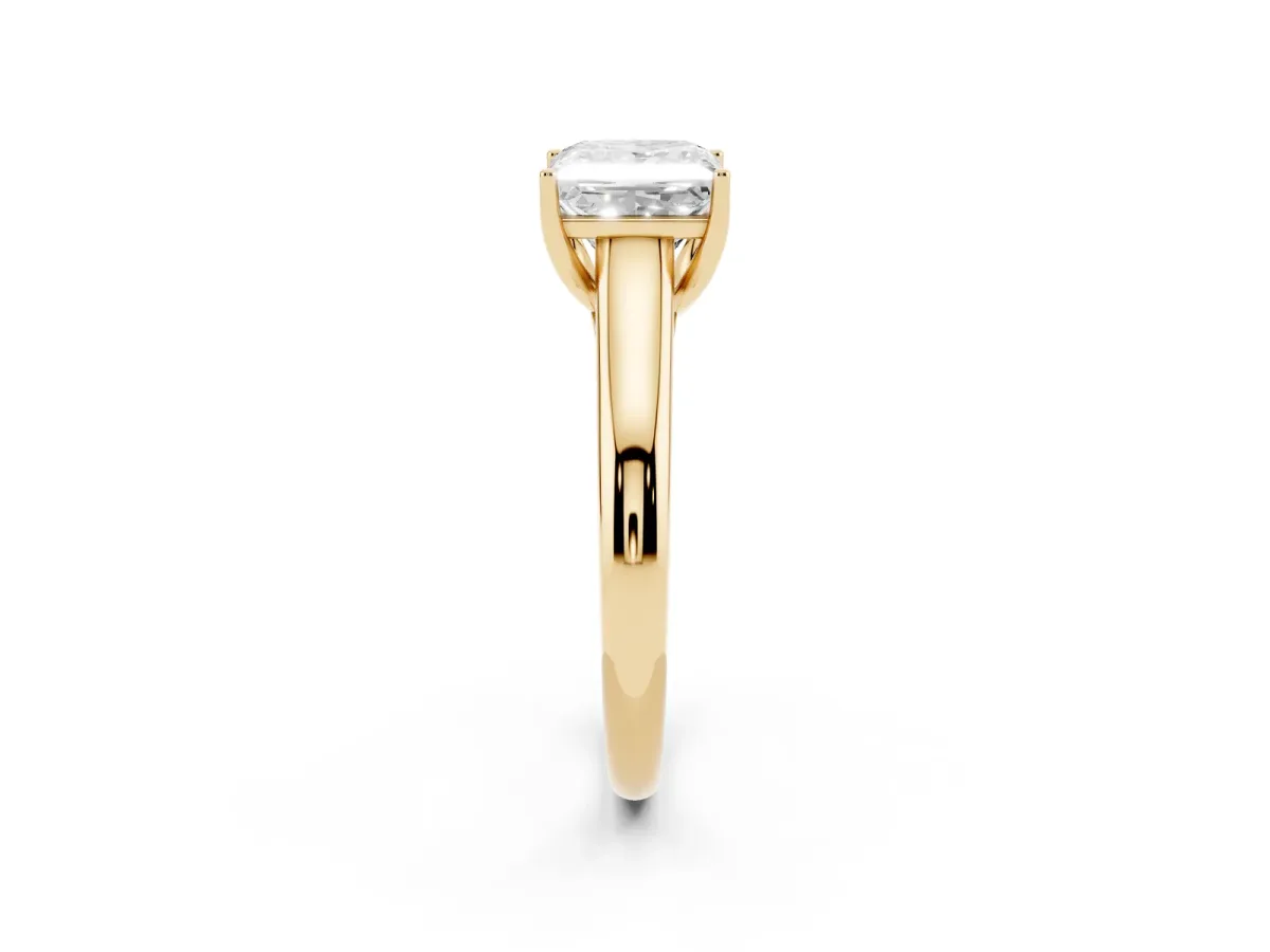 Princess Cut Solitaire Engagement Ring with Tapered Band and Four-Prong Setting Yellow gold