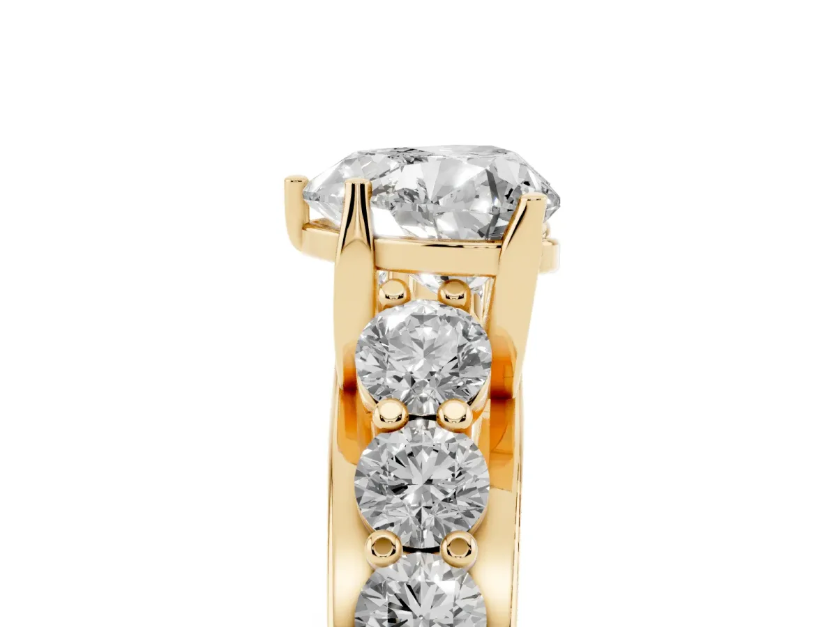 Heart Cut Diamond Engagement Ring with Pavé Band and Four-Prong Setting Yellow gold
