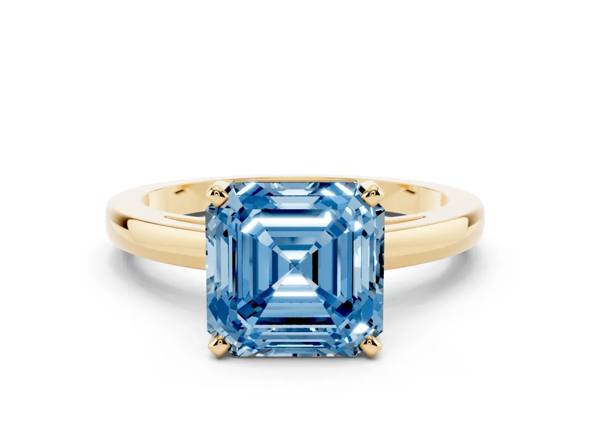 Fancy Blue Asscher Cut Solitaire Diamond Engagement Ring with Four-Prong Setting on a Classic Band Yellow gold