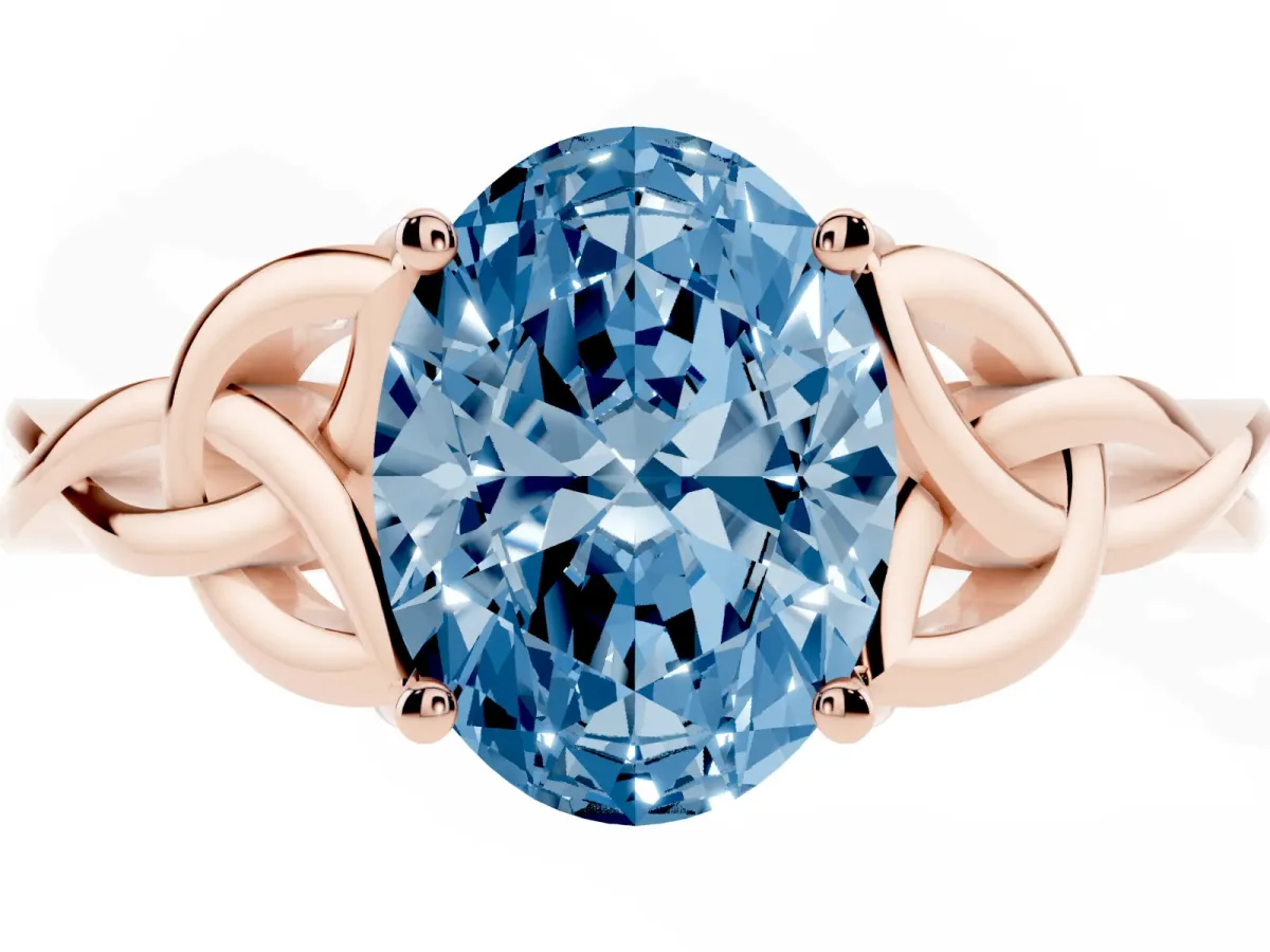 Fancy Blue Oval Cut Diamond Solitaire Engagement Ring with Celtic Knot Band and Four-Prong Setting Rose gold