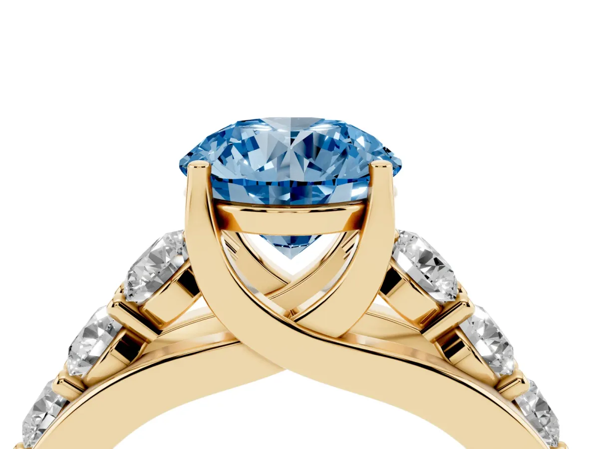 Fancy Blue Round Cut Diamond Engagement Ring with Pavé Band and Four-Prong Setting Yellow gold