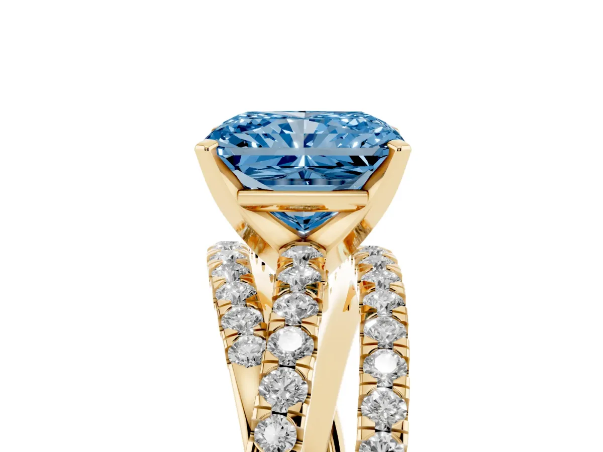 Fancy Blue Radiant Cut Solitaire Twist Band with Pavé Setting and Four-Prong Setting Yellow gold