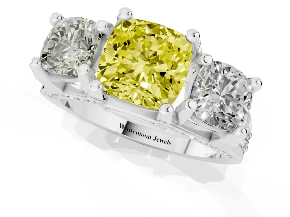 Fancy Yellow Cushion Cut Diamond Three-Stone Ring with Channel Set Band and Four-Prong Setting Silver