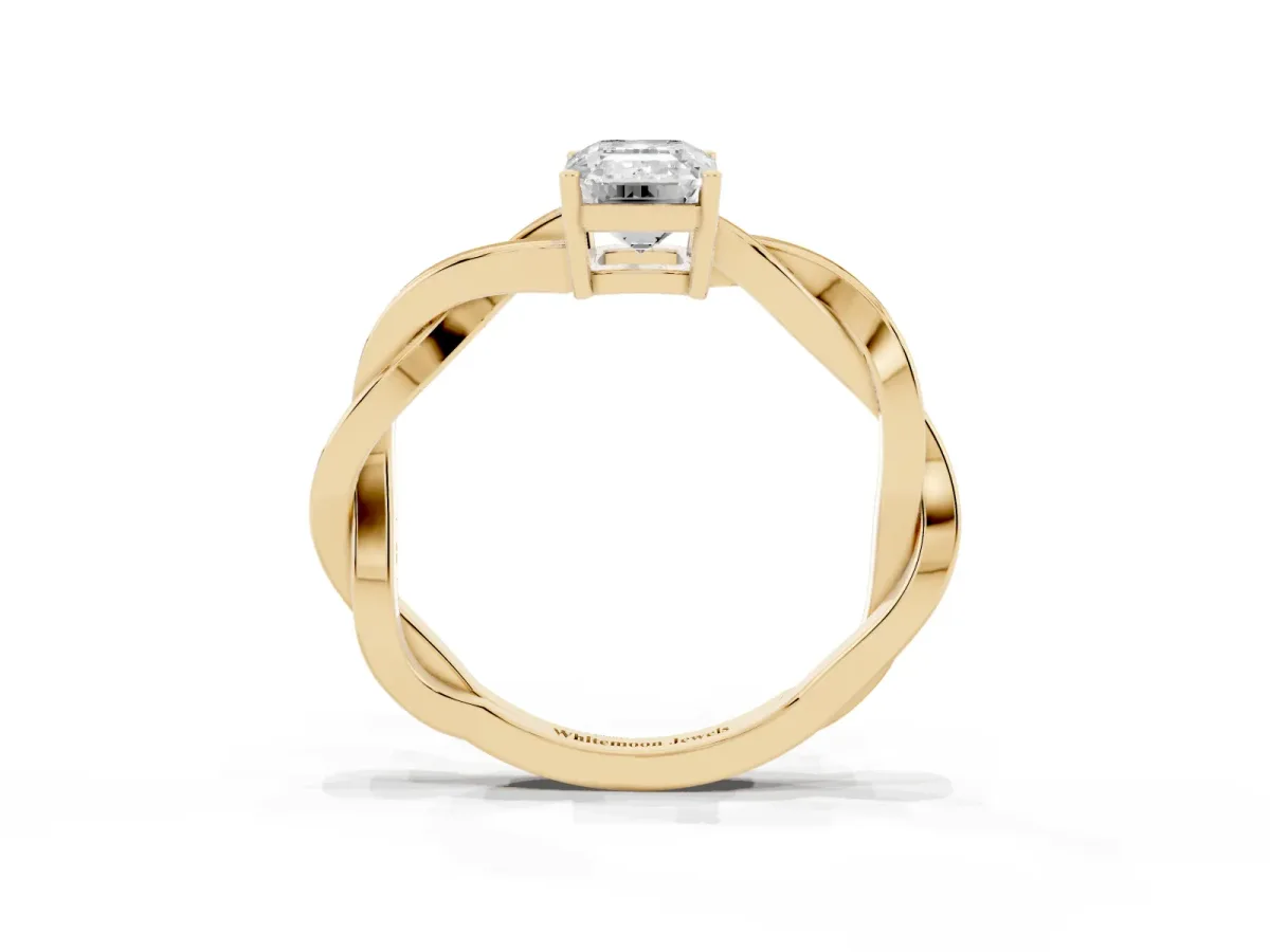 Emerald Cut Solitaire Twisted Pave Diamond Ring with Four-Prong Setting Yellow gold