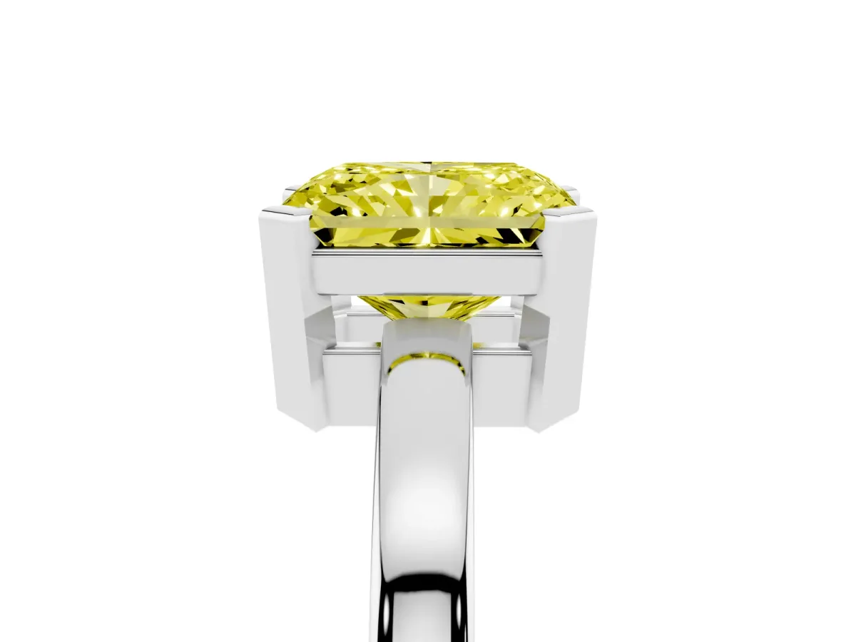 Fancy Yellow Radiant Cut Cut Solitaire Ring with Four-Prong Setting and Classic Band Silver