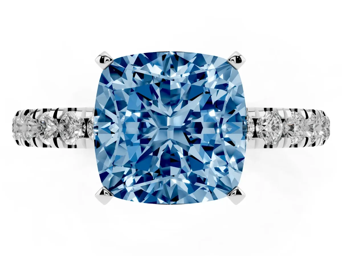 Fancy Blue Cushion Cut Diamond Solitaire Ring with Pavé Accents and Four-Prong Setting Silver