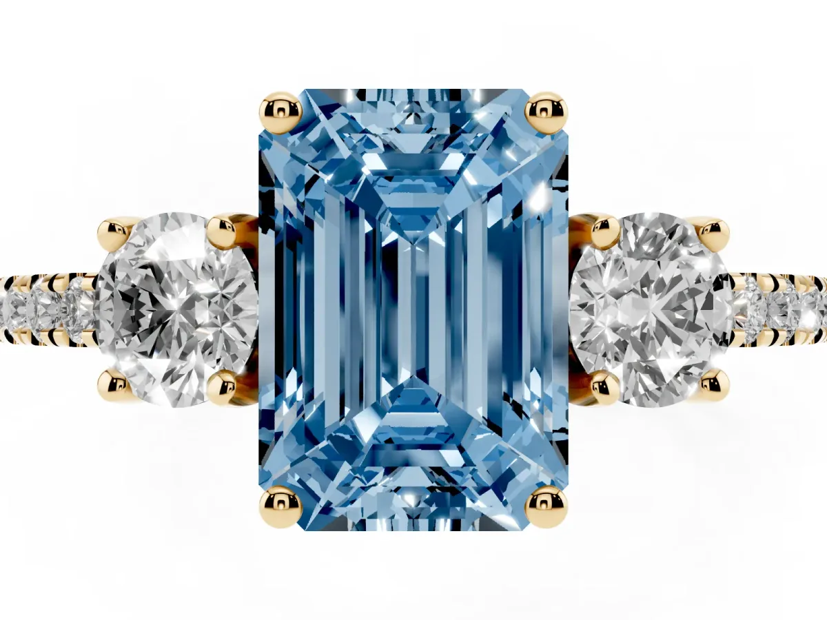 Fancy Blue Three-Stone Emerald Cut Cut Diamond Pavé Band with Prong Setting Yellow gold