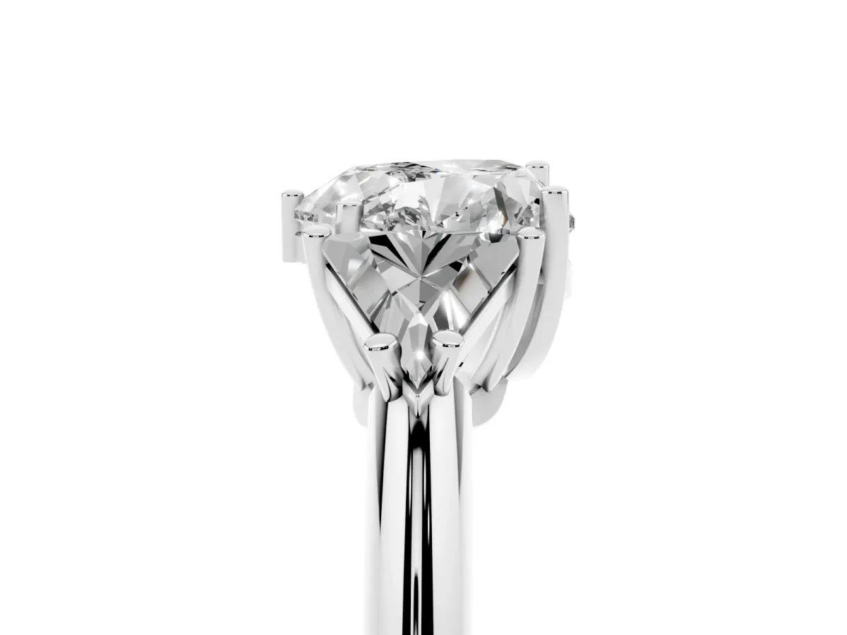 Three-Stone Heart Cut Diamond Engagement Ring with Trillion Side Stones and Prong Setting Silver