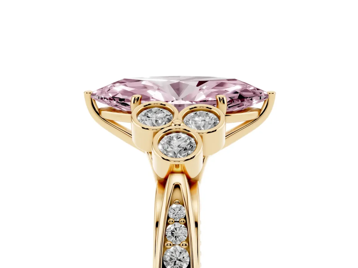 Fancy Pink Marquise Cut Cut Diamond Engagement Ring with Bezel Set Round Side Stones and Prong Setting Yellow gold