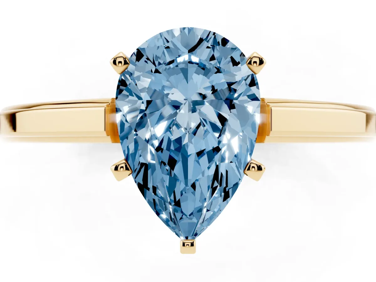 Fancy Blue Pear Cut Solitaire Diamond Ring with Four-Prong Setting and Classic Band Yellow gold