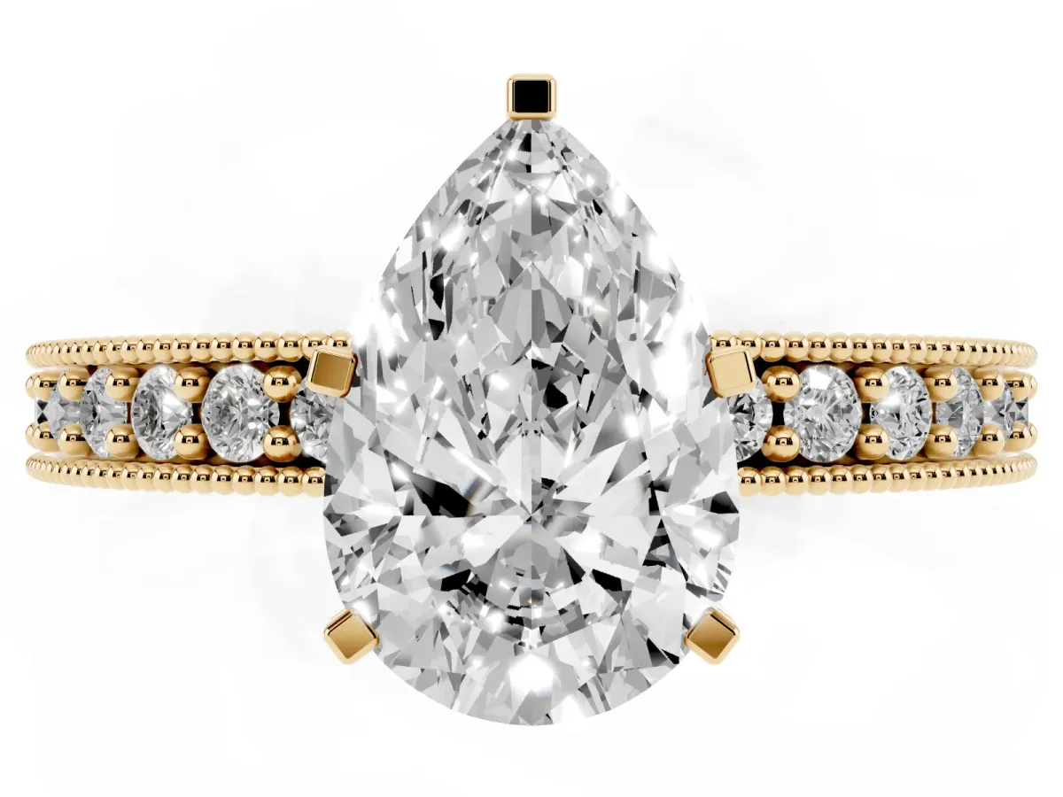 Pear Cut Diamond Milgrain Pavé Engagement Ring with Four-Prong Setting Yellow gold