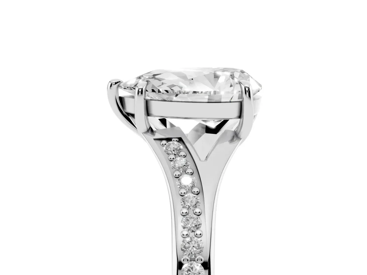 Pear Cut Diamond Solitaire Ring with Pavé Band and Prong Setting Silver