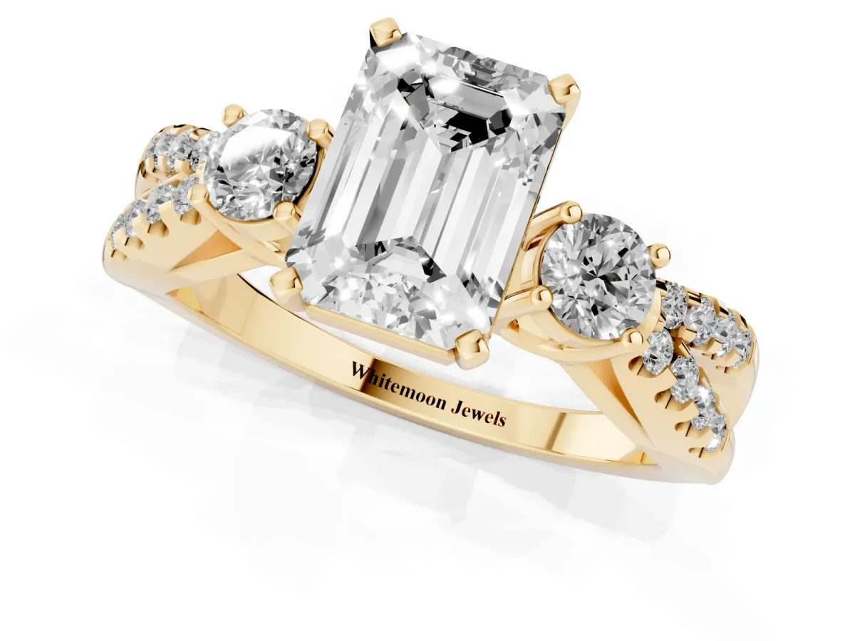 Emerald Cut Diamond Three-Stone Ring with Pavé Split Shank and Four-Prong Setting Yellow gold