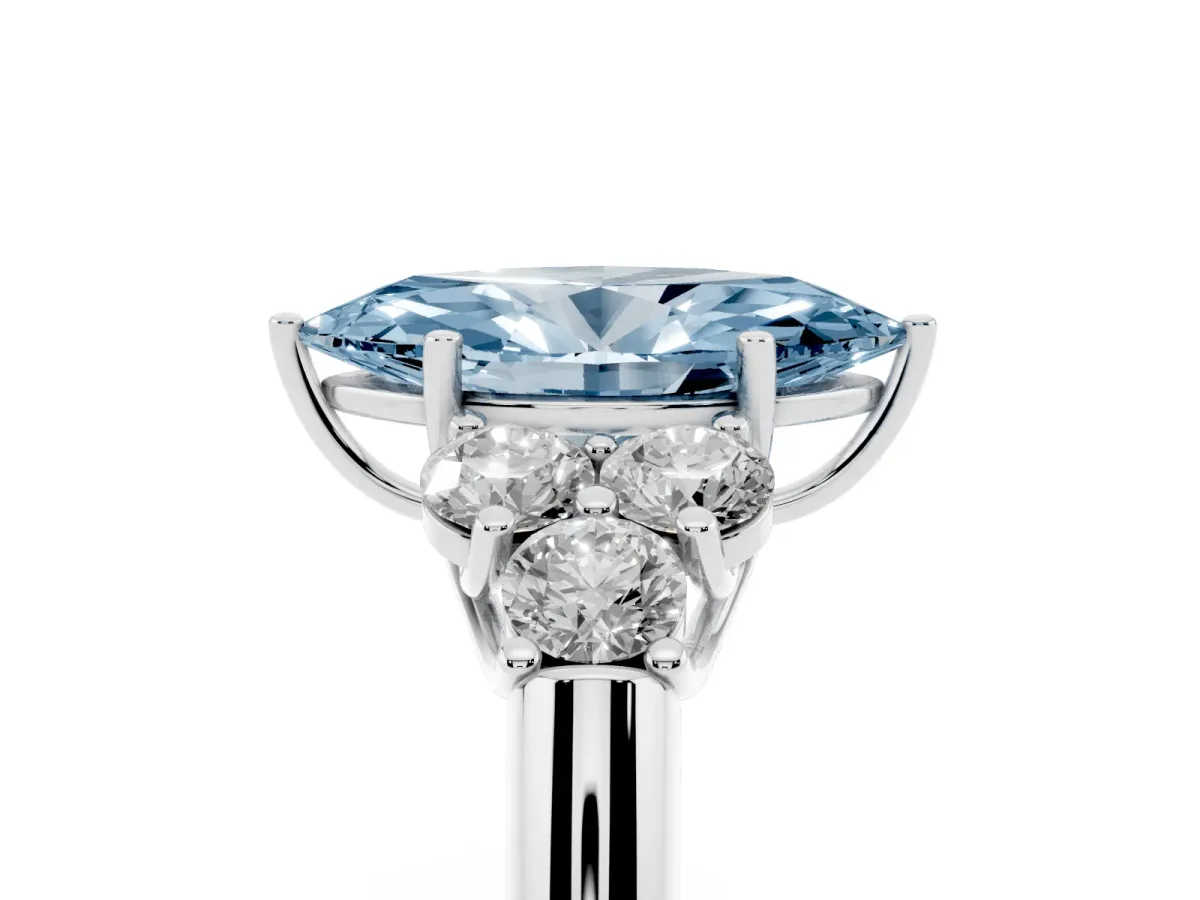 Fancy Blue Marquise Cut Cut Diamond Cluster Ring with Round Accent Stones and Prong Setting on a Classic Band Platinum