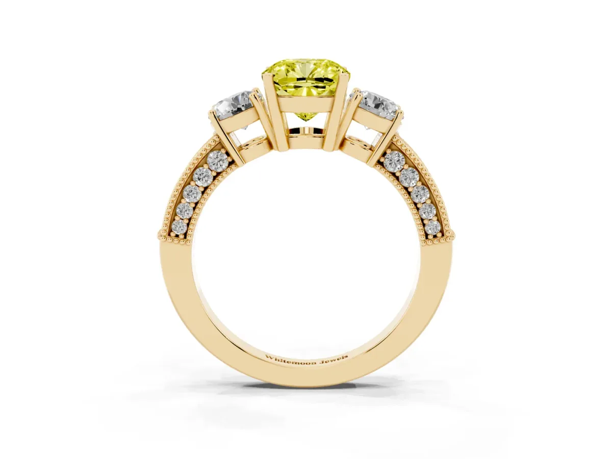 Fancy Yellow Cushion Cut Three-Stone Diamond Ring with Pavé Band and Four-Prong Setting Yellow gold