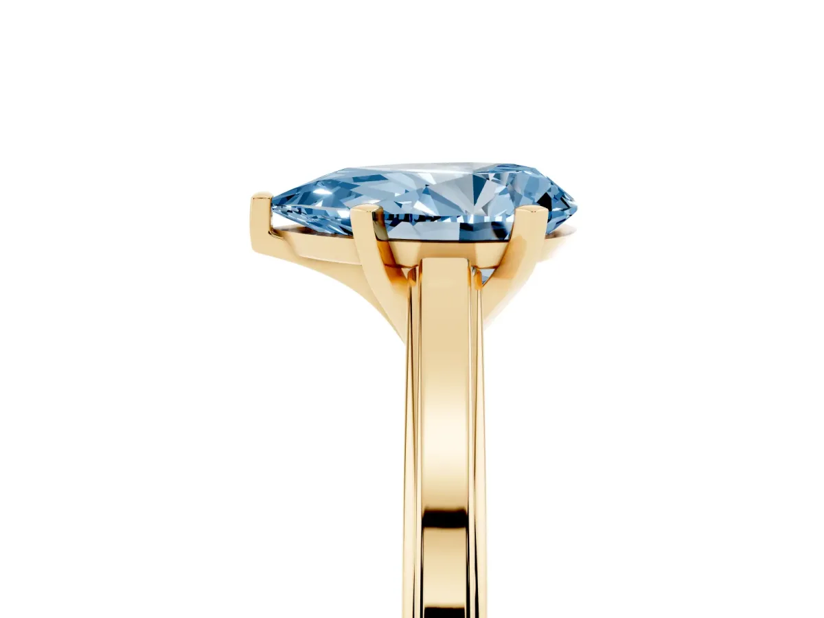 Fancy Blue Pear Cut Solitaire Diamond Ring with Four-Prong Setting and Classic Band Yellow gold