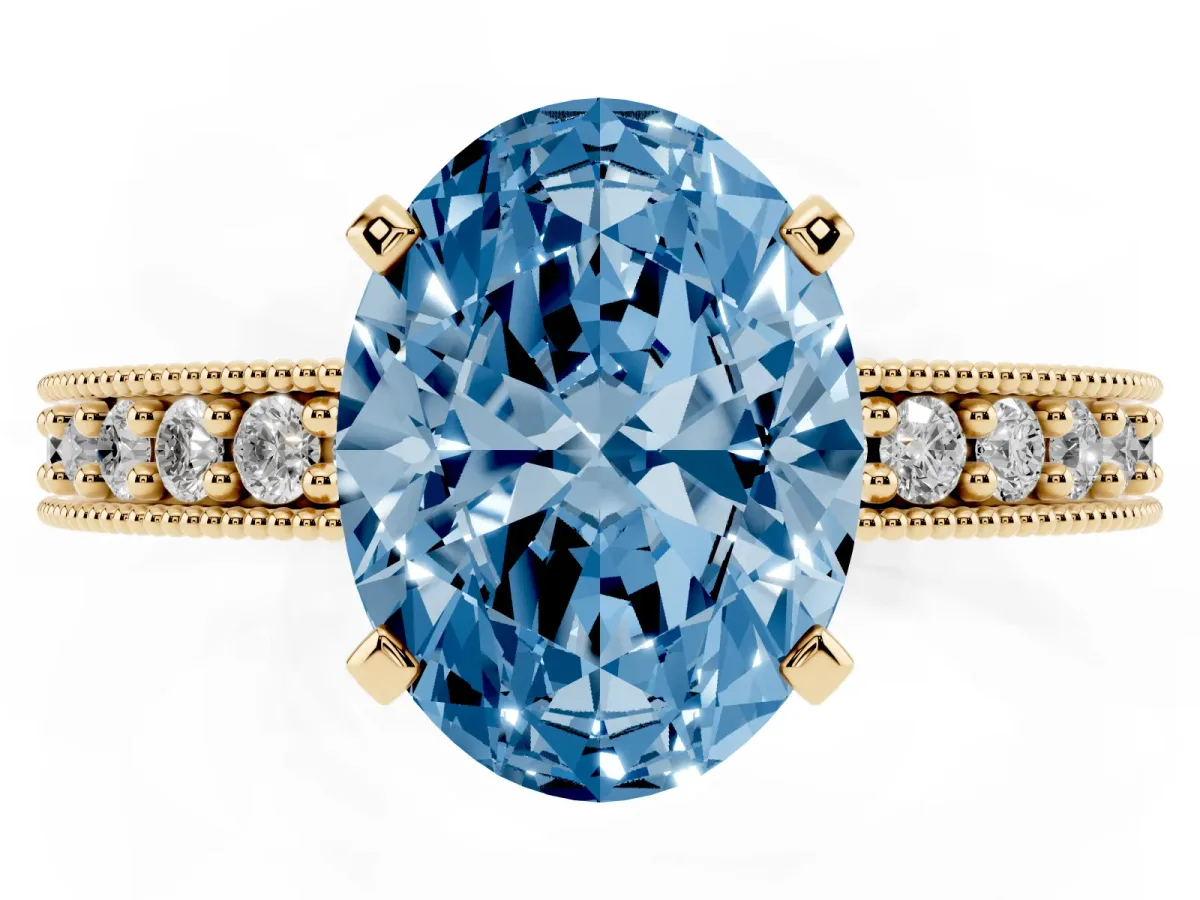 Fancy Blue Oval Cut Diamond Milgrain Pavé Engagement Ring with Four-Prong Setting Yellow gold