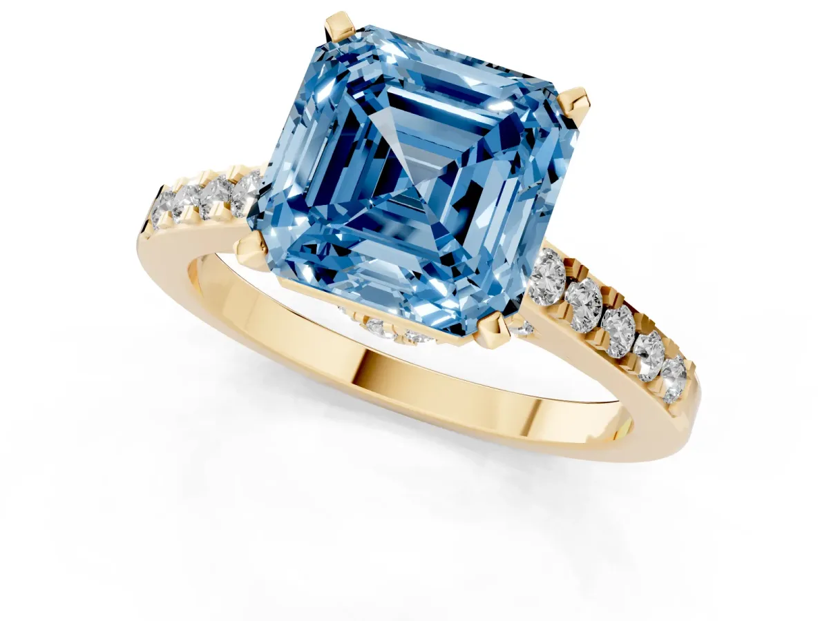 Fancy Blue Asscher Cut Diamond Solitaire Ring with Crossover Gallery and Round Pavé Band Yellow gold