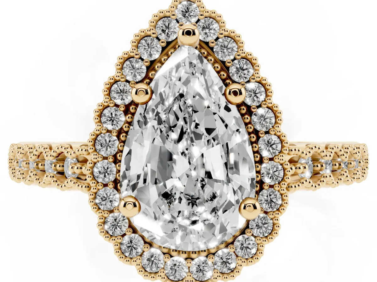 Pear Cut Cut Halo Pavé Solitaire Ring with Milgrain Band Yellow gold